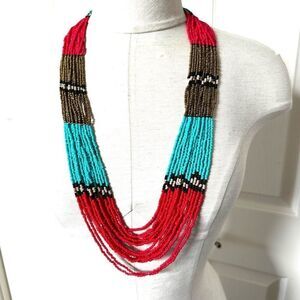 Long multi strand beaded statement necklace